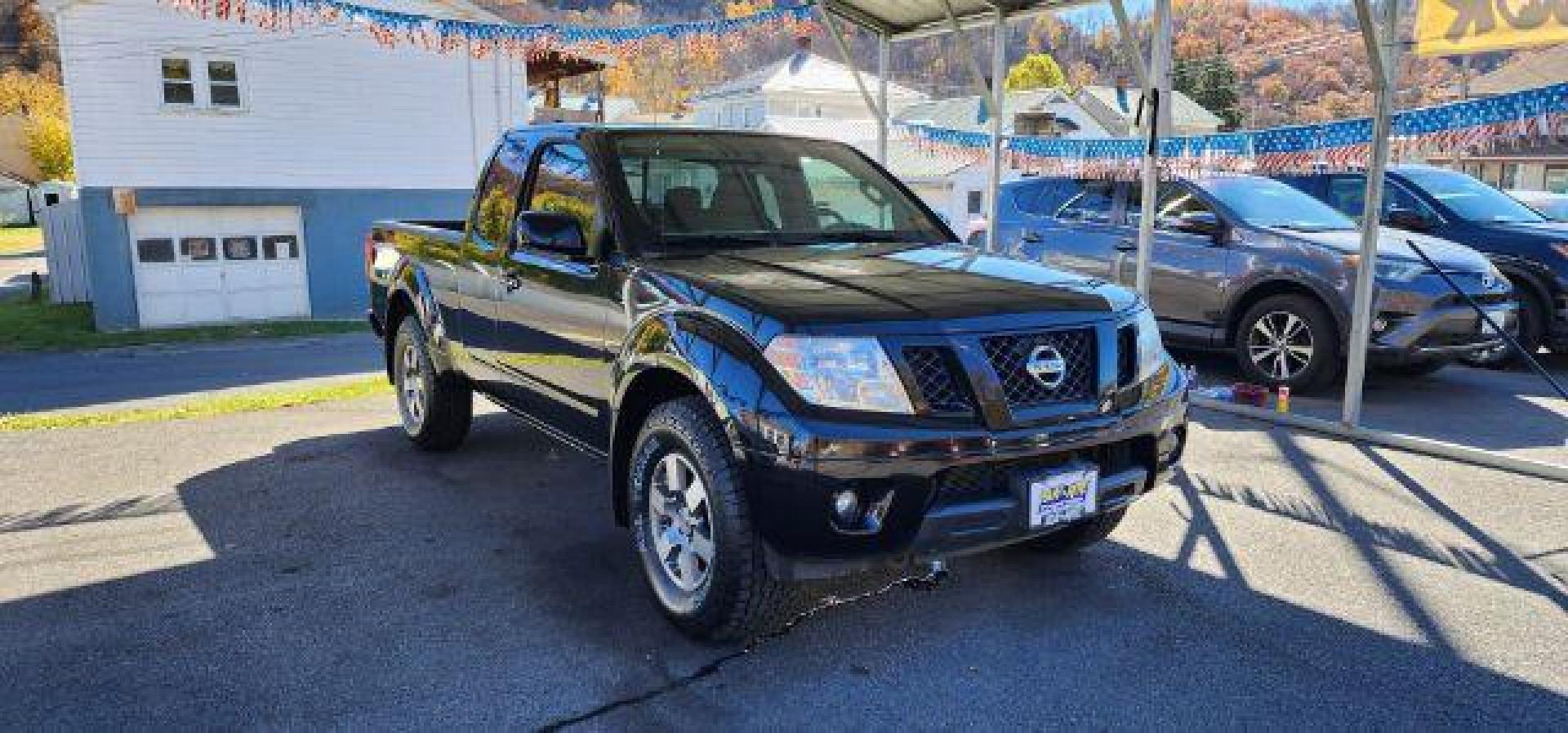 2012 BLACK /Charcoal, cloth Nissan Frontier PRO-4X (1N6AD0CWXCC) with an 4.0 V6 engine, 6 Speed transmission, located at 353 S. Mineral St., Keyser, WV, 26726, (304) 788-7887, 39.436451, -78.981674 - Photo#0