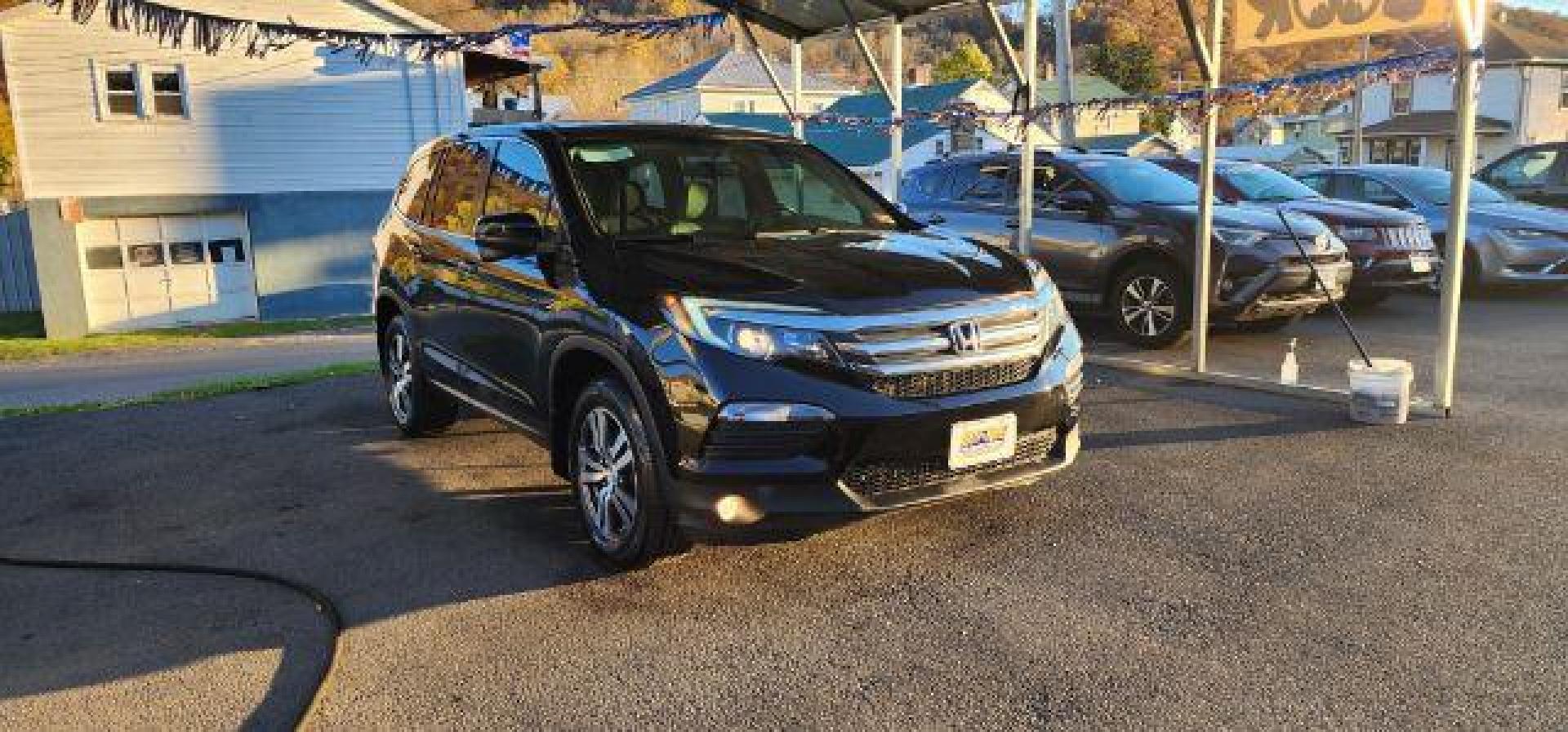 2017 BLACK /Gray Honda Pilot EX-L (5FNYF6H59HB) with an 3.5L V6 engine, AT transmission, located at 353 S. Mineral St., Keyser, WV, 26726, (304) 788-7887, 39.436451, -78.981674 - Photo#0