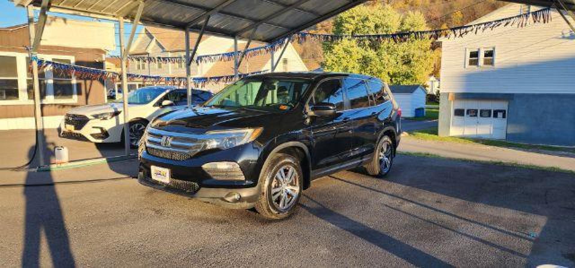 2017 BLACK /Gray Honda Pilot EX-L (5FNYF6H59HB) with an 3.5L V6 engine, AT transmission, located at 353 S. Mineral St., Keyser, WV, 26726, (304) 788-7887, 39.436451, -78.981674 - Photo#2