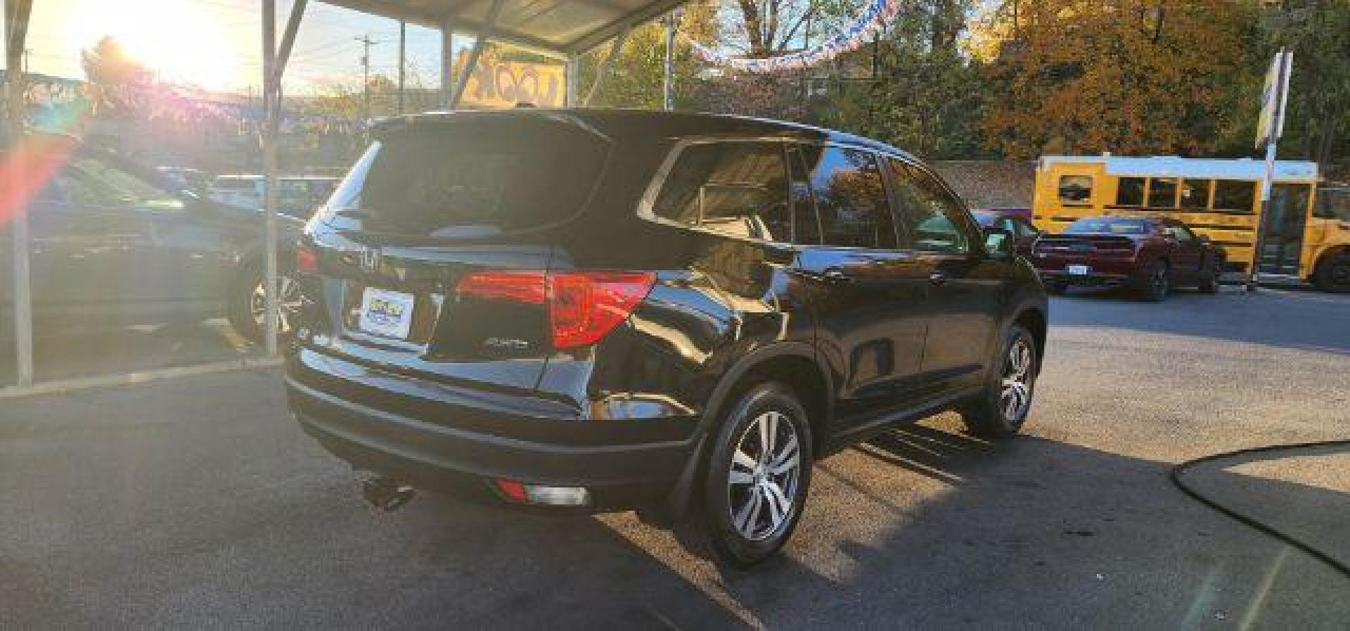 2017 BLACK /Gray Honda Pilot EX-L (5FNYF6H59HB) with an 3.5L V6 engine, AT transmission, located at 353 S. Mineral St., Keyser, WV, 26726, (304) 788-7887, 39.436451, -78.981674 - Photo#13