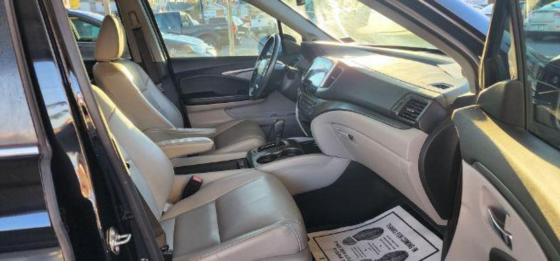 2017 BLACK /Gray Honda Pilot EX-L (5FNYF6H59HB) with an 3.5L V6 engine, AT transmission, located at 353 S. Mineral St., Keyser, WV, 26726, (304) 788-7887, 39.436451, -78.981674 - Photo#16