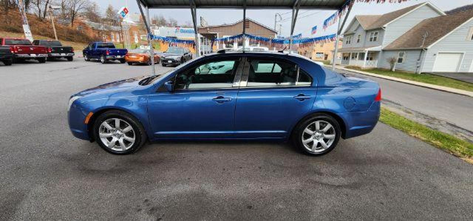 2010 BLUE /Dark Charcoal Mercury Milan Premier (3MEHM0JA9AR) with an 2.5 L4 engine, AT transmission, located at 353 S. Mineral St., Keyser, WV, 26726, (304) 788-7887, 39.436451, -78.981674 - Photo#3