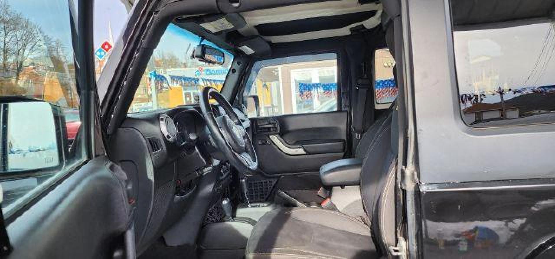 2014 BLACK Jeep Wrangler Sahara (1C4AJWBG8EL) with an 3.6L V6 engine, AT transmission, located at 353 S. Mineral St., Keyser, WV, 26726, (304) 788-7887, 39.436451, -78.981674 - Photo#4