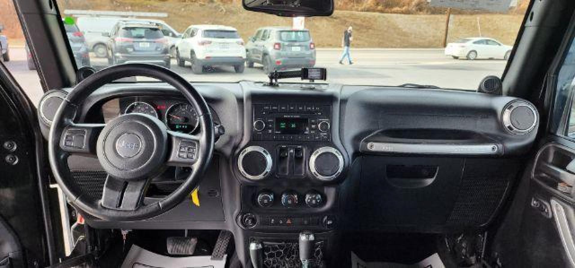 2014 BLACK Jeep Wrangler Sahara (1C4AJWBG8EL) with an 3.6L V6 engine, AT transmission, located at 353 S. Mineral St., Keyser, WV, 26726, (304) 788-7887, 39.436451, -78.981674 - Photo#7