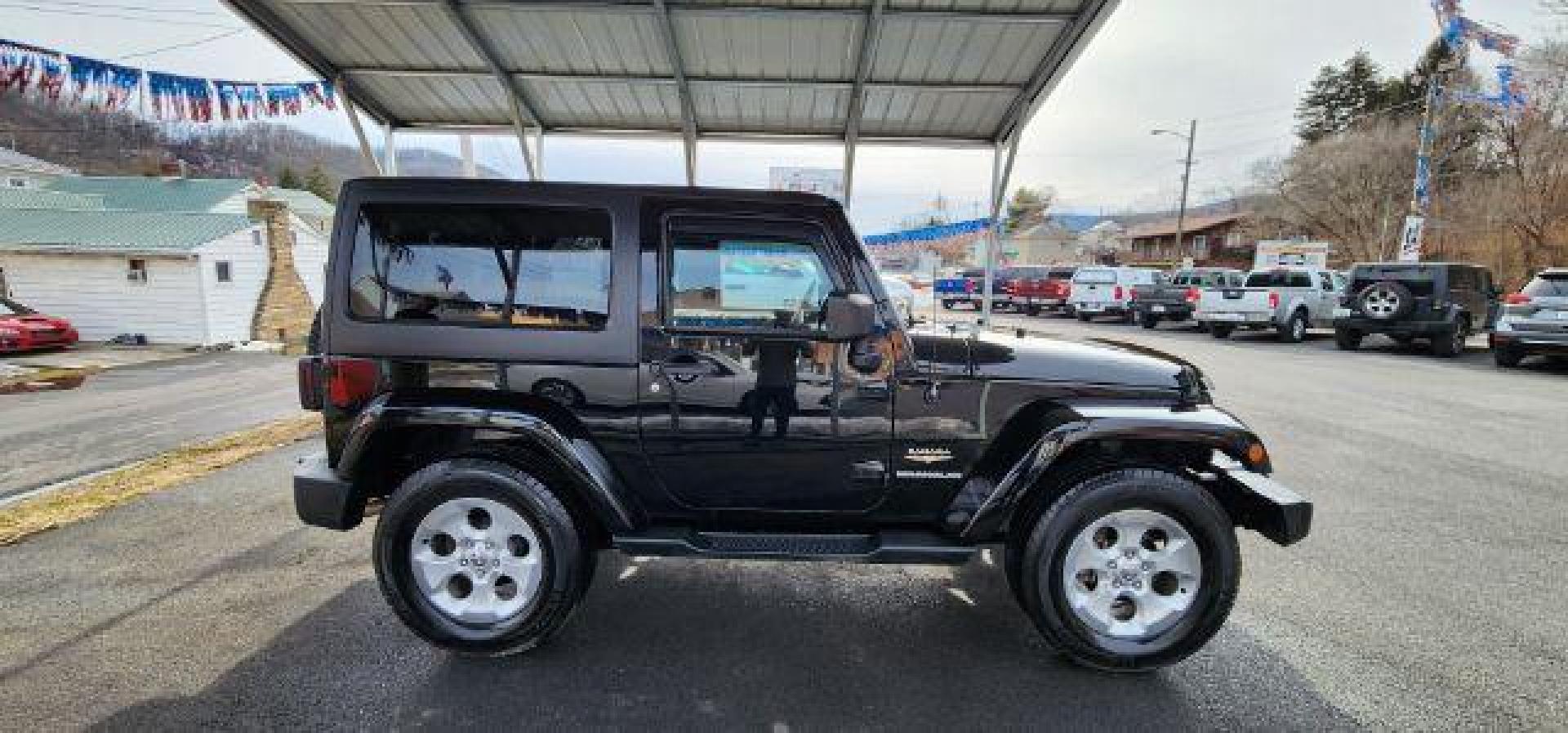 2014 BLACK Jeep Wrangler Sahara (1C4AJWBG8EL) with an 3.6L V6 engine, AT transmission, located at 353 S. Mineral St., Keyser, WV, 26726, (304) 788-7887, 39.436451, -78.981674 - Photo#12