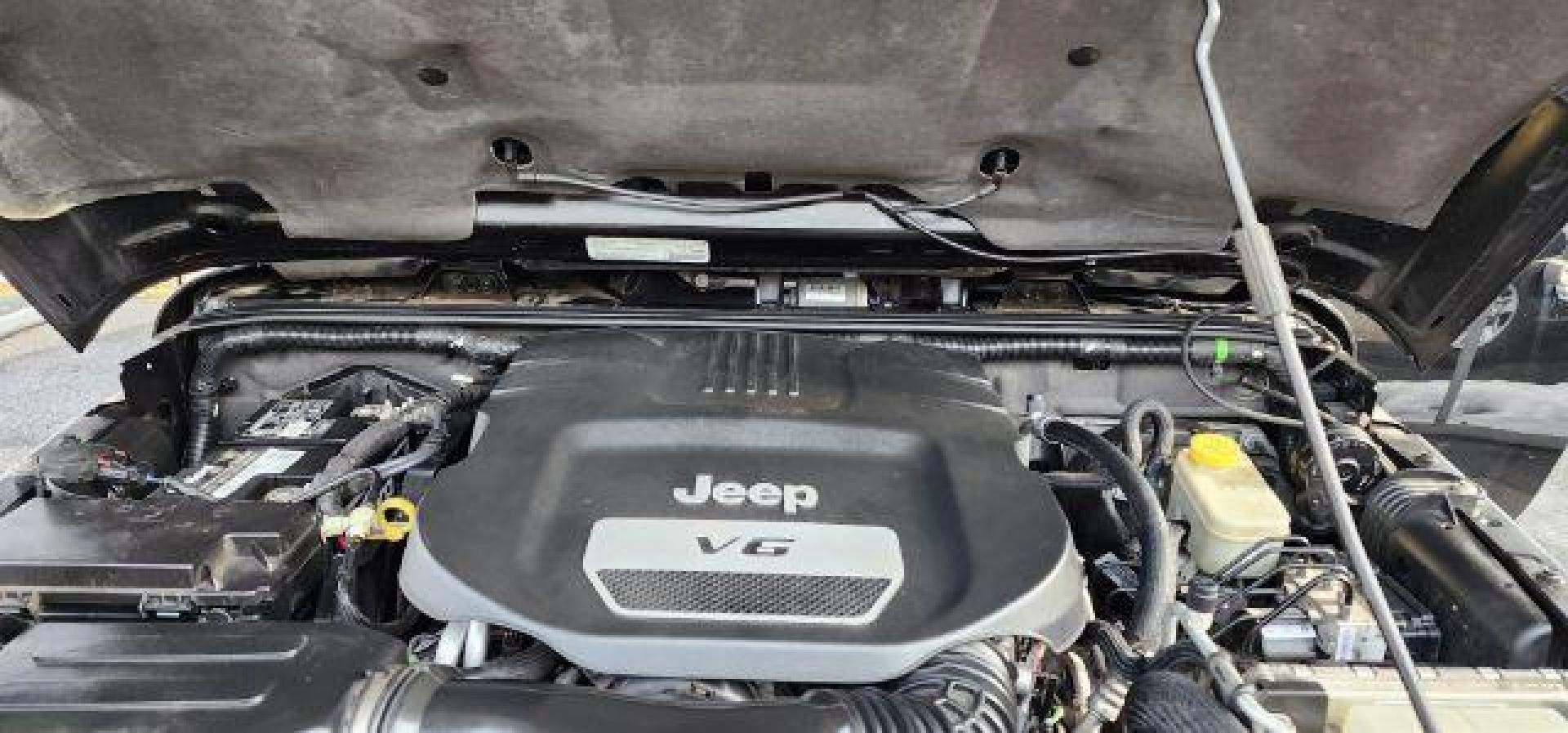 2014 BLACK Jeep Wrangler Sahara (1C4AJWBG8EL) with an 3.6L V6 engine, AT transmission, located at 353 S. Mineral St., Keyser, WV, 26726, (304) 788-7887, 39.436451, -78.981674 - Photo#14