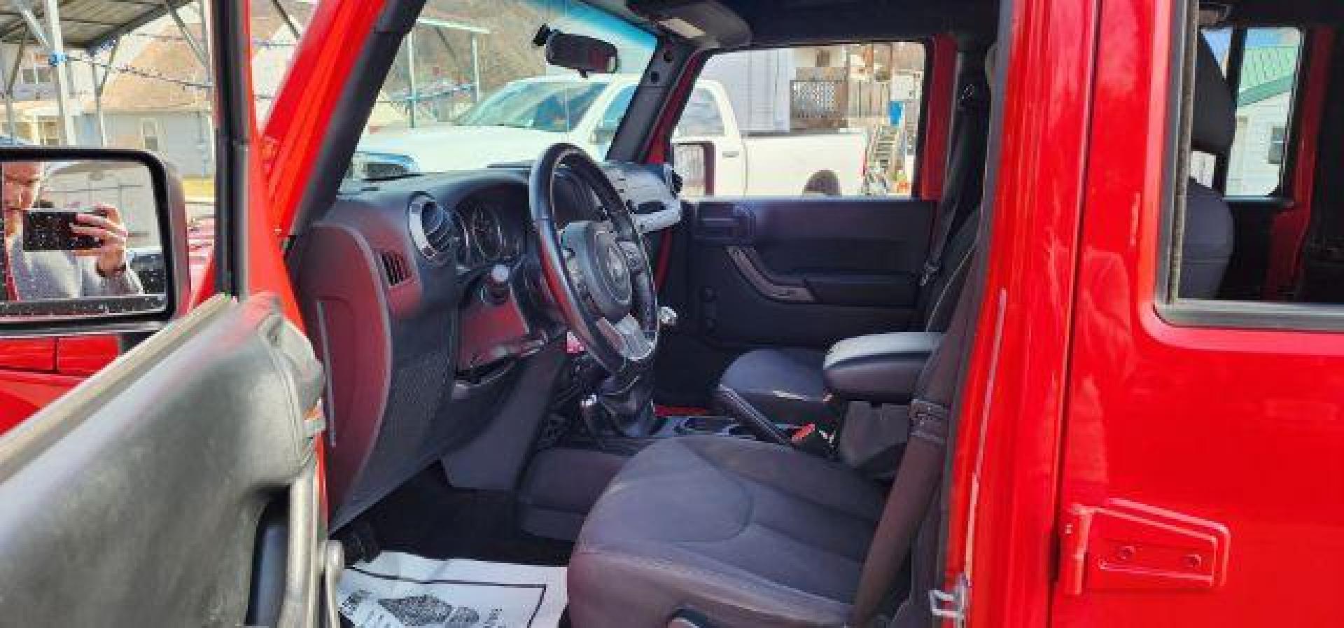 2018 RED /Black Jeep Wrangler JK Unlimited Sport 4x4 (1C4BJWDG4JL) with an 3.6L V6 engine, 6 sp transmission, located at 353 S. Mineral St., Keyser, WV, 26726, (304) 788-7887, 39.436451, -78.981674 - Photo#4