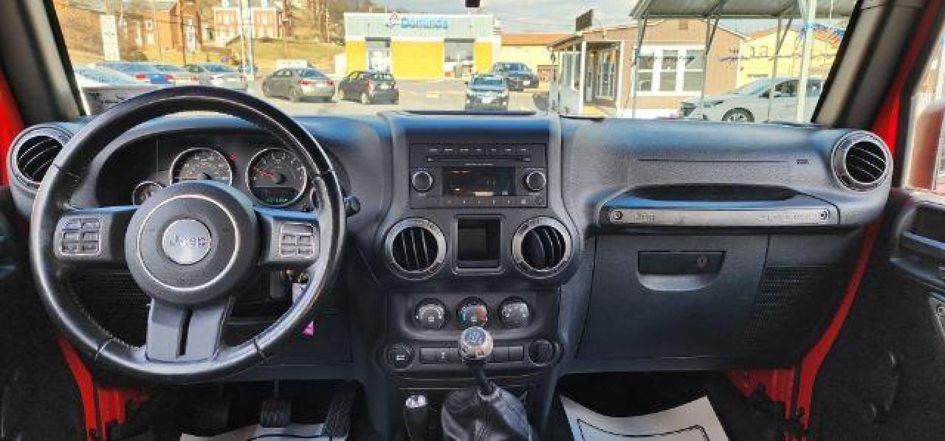 2018 RED /Black Jeep Wrangler JK Unlimited Sport 4x4 (1C4BJWDG4JL) with an 3.6L V6 engine, 6 sp transmission, located at 353 S. Mineral St., Keyser, WV, 26726, (304) 788-7887, 39.436451, -78.981674 - Photo#6