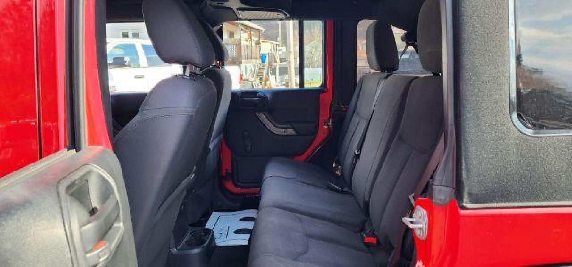 2018 RED /Black Jeep Wrangler JK Unlimited Sport 4x4 (1C4BJWDG4JL) with an 3.6L V6 engine, 6 sp transmission, located at 353 S. Mineral St., Keyser, WV, 26726, (304) 788-7887, 39.436451, -78.981674 - Photo#7