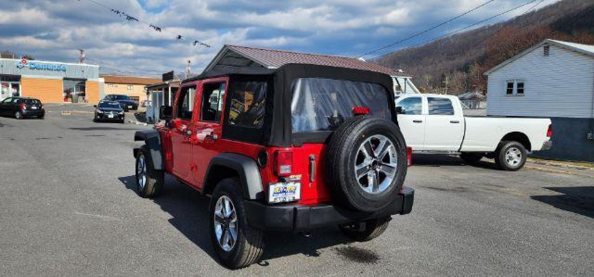 2018 RED /Black Jeep Wrangler JK Unlimited Sport 4x4 (1C4BJWDG4JL) with an 3.6L V6 engine, 6 sp transmission, located at 353 S. Mineral St., Keyser, WV, 26726, (304) 788-7887, 39.436451, -78.981674 - Photo#8
