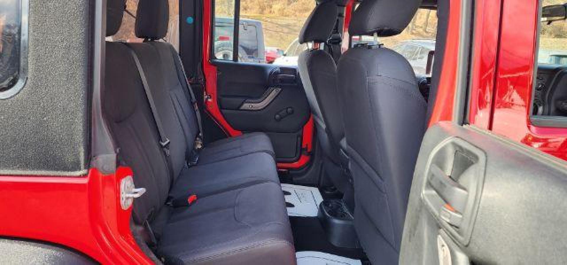 2018 RED /Black Jeep Wrangler JK Unlimited Sport 4x4 (1C4BJWDG4JL) with an 3.6L V6 engine, 6 sp transmission, located at 353 S. Mineral St., Keyser, WV, 26726, (304) 788-7887, 39.436451, -78.981674 - Photo#13