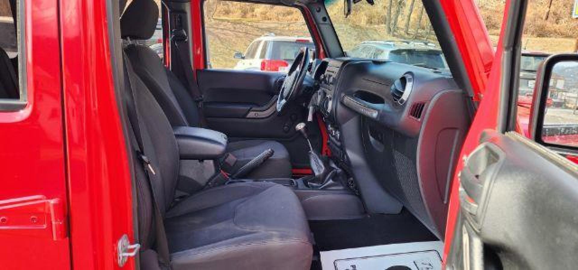 2018 RED /Black Jeep Wrangler JK Unlimited Sport 4x4 (1C4BJWDG4JL) with an 3.6L V6 engine, 6 sp transmission, located at 353 S. Mineral St., Keyser, WV, 26726, (304) 788-7887, 39.436451, -78.981674 - Photo#14