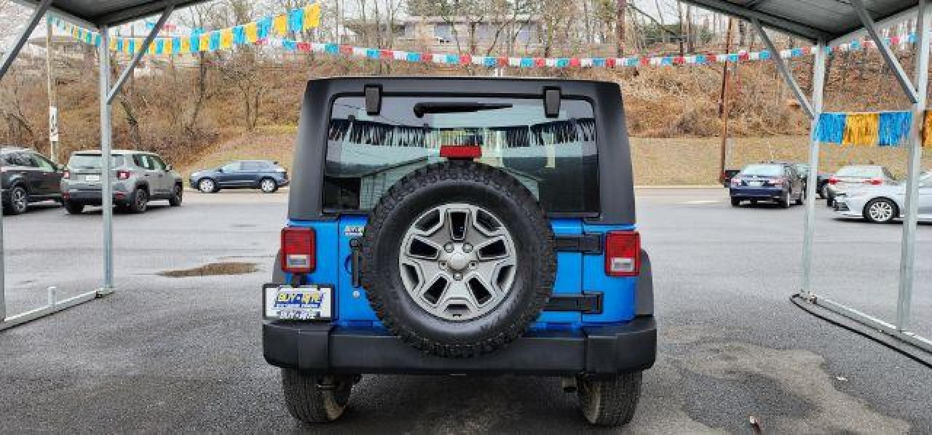 2015 BLUE /Black Jeep Wrangler Rubicon (1C4BJWCGXFL) with an 3.6L V6 engine, AT transmission, located at 353 S. Mineral St., Keyser, WV, 26726, (304) 788-7887, 39.436451, -78.981674 - Photo#8