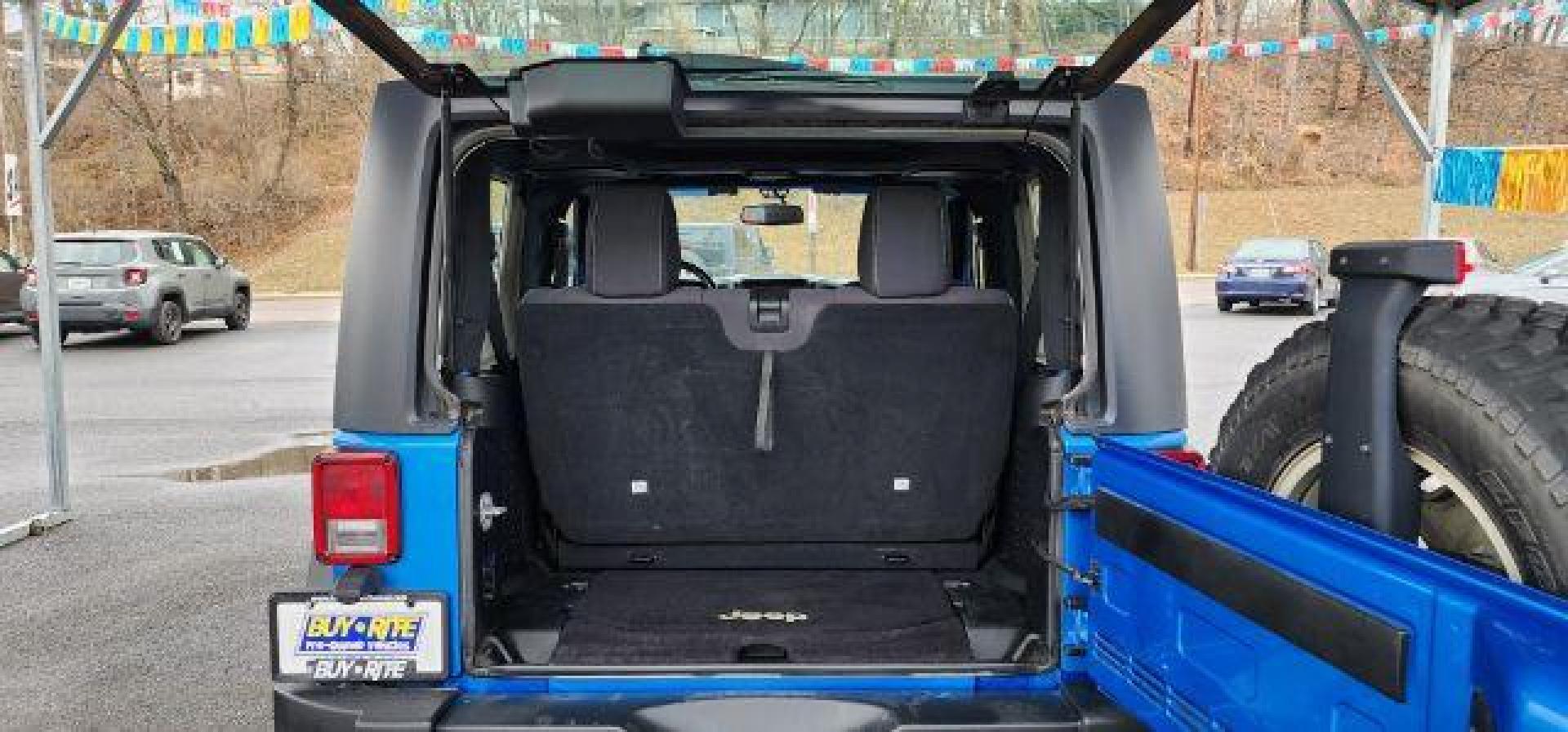 2015 BLUE /Black Jeep Wrangler Rubicon (1C4BJWCGXFL) with an 3.6L V6 engine, AT transmission, located at 353 S. Mineral St., Keyser, WV, 26726, (304) 788-7887, 39.436451, -78.981674 - Photo#9