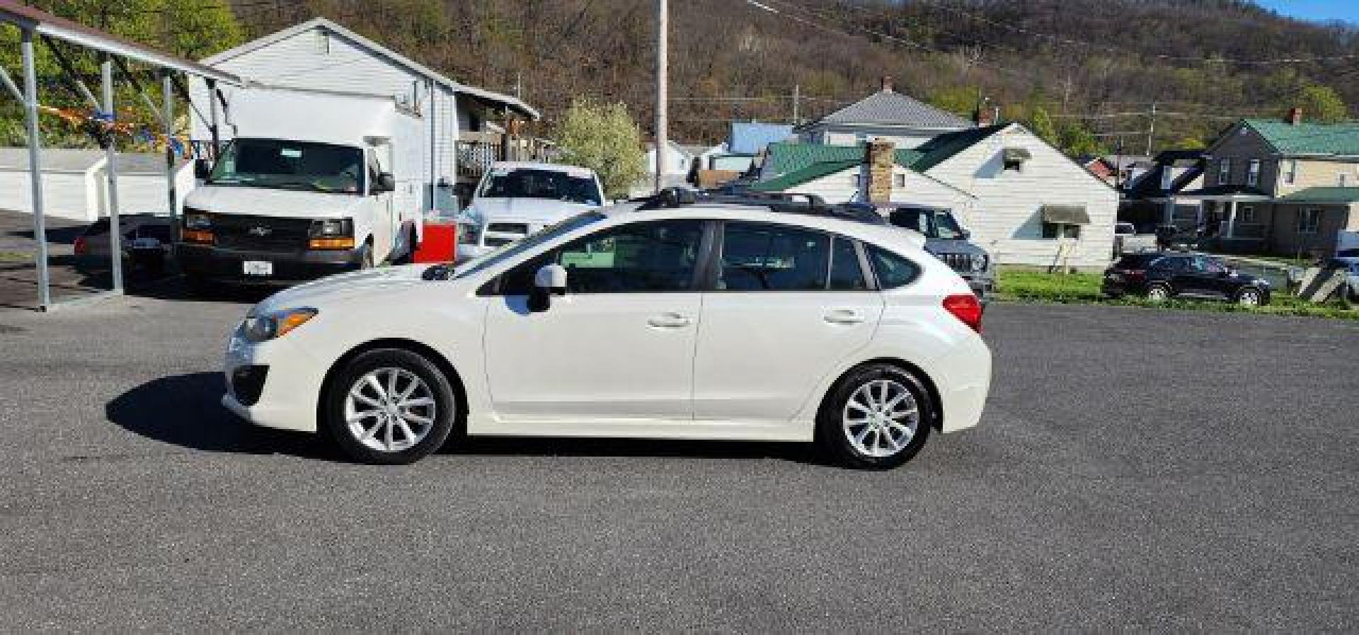 2013 WHITE /Ivory Subaru Impreza 2.0i Sport Limited (JF1GPAR68D2) with an 2.0L L4 engine, CVT transmission, located at 353 S. Mineral St., Keyser, WV, 26726, (304) 788-7887, 39.436451, -78.981674 - Photo#3
