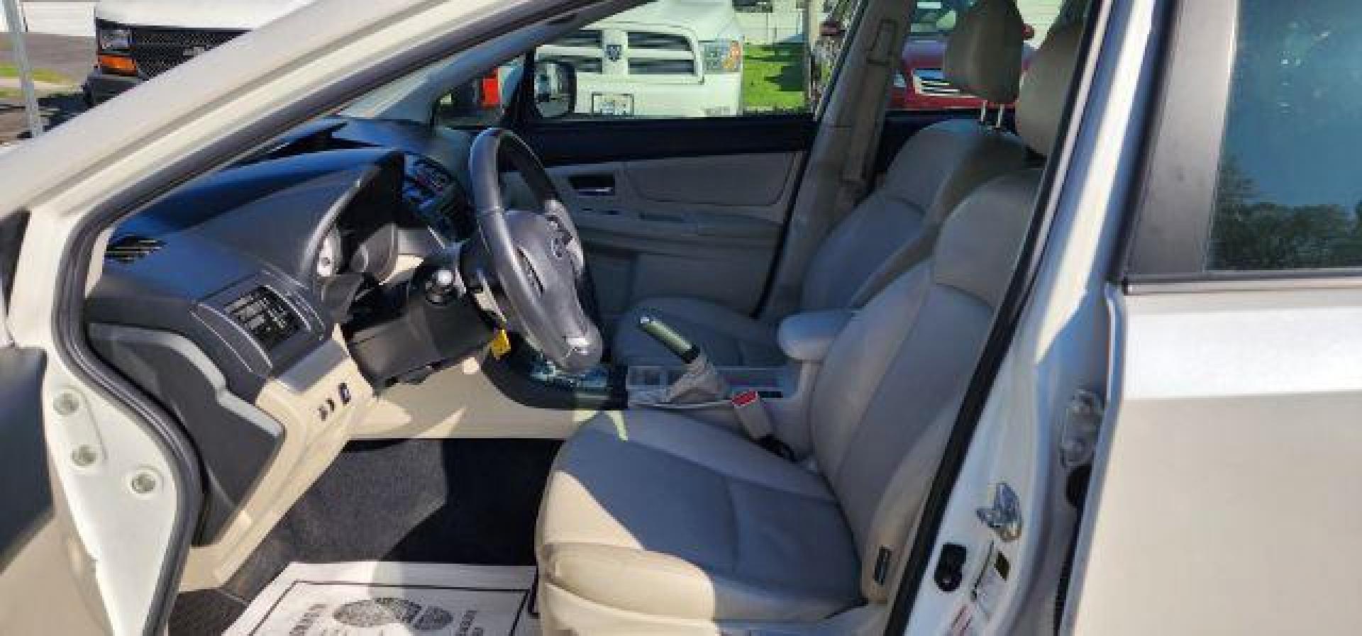2013 WHITE /Ivory Subaru Impreza 2.0i Sport Limited (JF1GPAR68D2) with an 2.0L L4 engine, CVT transmission, located at 353 S. Mineral St., Keyser, WV, 26726, (304) 788-7887, 39.436451, -78.981674 - Photo#4