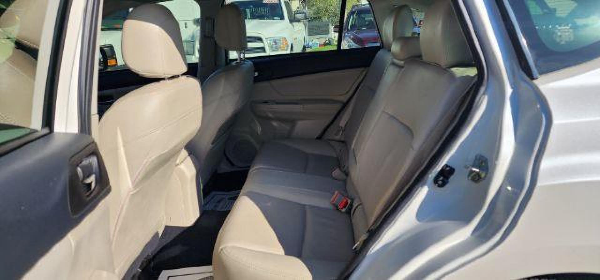 2013 WHITE /Ivory Subaru Impreza 2.0i Sport Limited (JF1GPAR68D2) with an 2.0L L4 engine, CVT transmission, located at 353 S. Mineral St., Keyser, WV, 26726, (304) 788-7887, 39.436451, -78.981674 - Photo#7