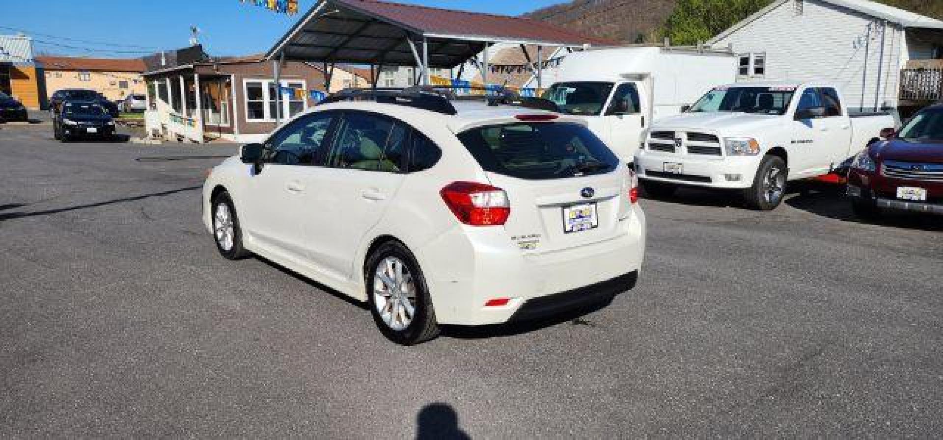 2013 WHITE /Ivory Subaru Impreza 2.0i Sport Limited (JF1GPAR68D2) with an 2.0L L4 engine, CVT transmission, located at 353 S. Mineral St., Keyser, WV, 26726, (304) 788-7887, 39.436451, -78.981674 - Photo#8