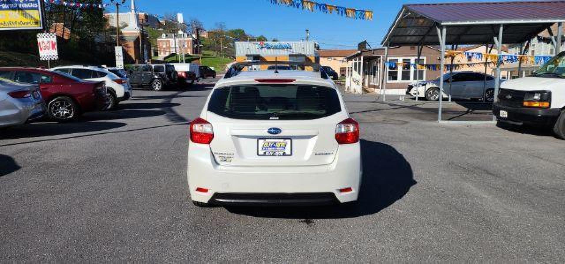 2013 WHITE /Ivory Subaru Impreza 2.0i Sport Limited (JF1GPAR68D2) with an 2.0L L4 engine, CVT transmission, located at 353 S. Mineral St., Keyser, WV, 26726, (304) 788-7887, 39.436451, -78.981674 - Photo#9