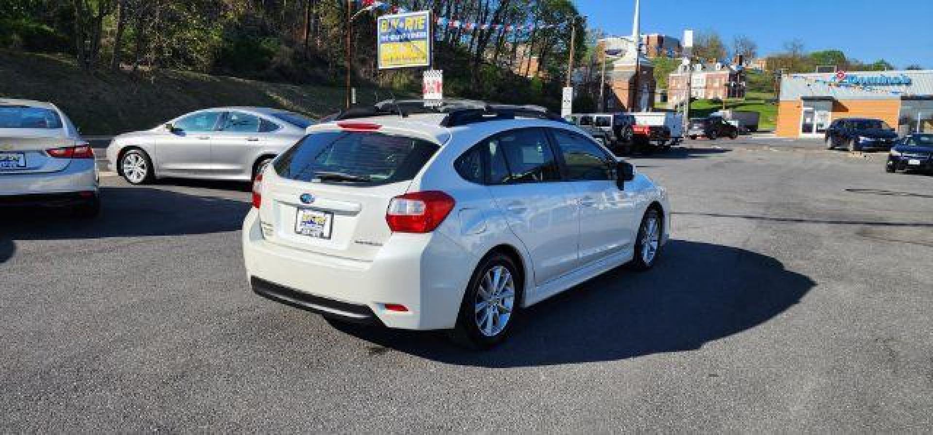 2013 WHITE /Ivory Subaru Impreza 2.0i Sport Limited (JF1GPAR68D2) with an 2.0L L4 engine, CVT transmission, located at 353 S. Mineral St., Keyser, WV, 26726, (304) 788-7887, 39.436451, -78.981674 - Photo#12