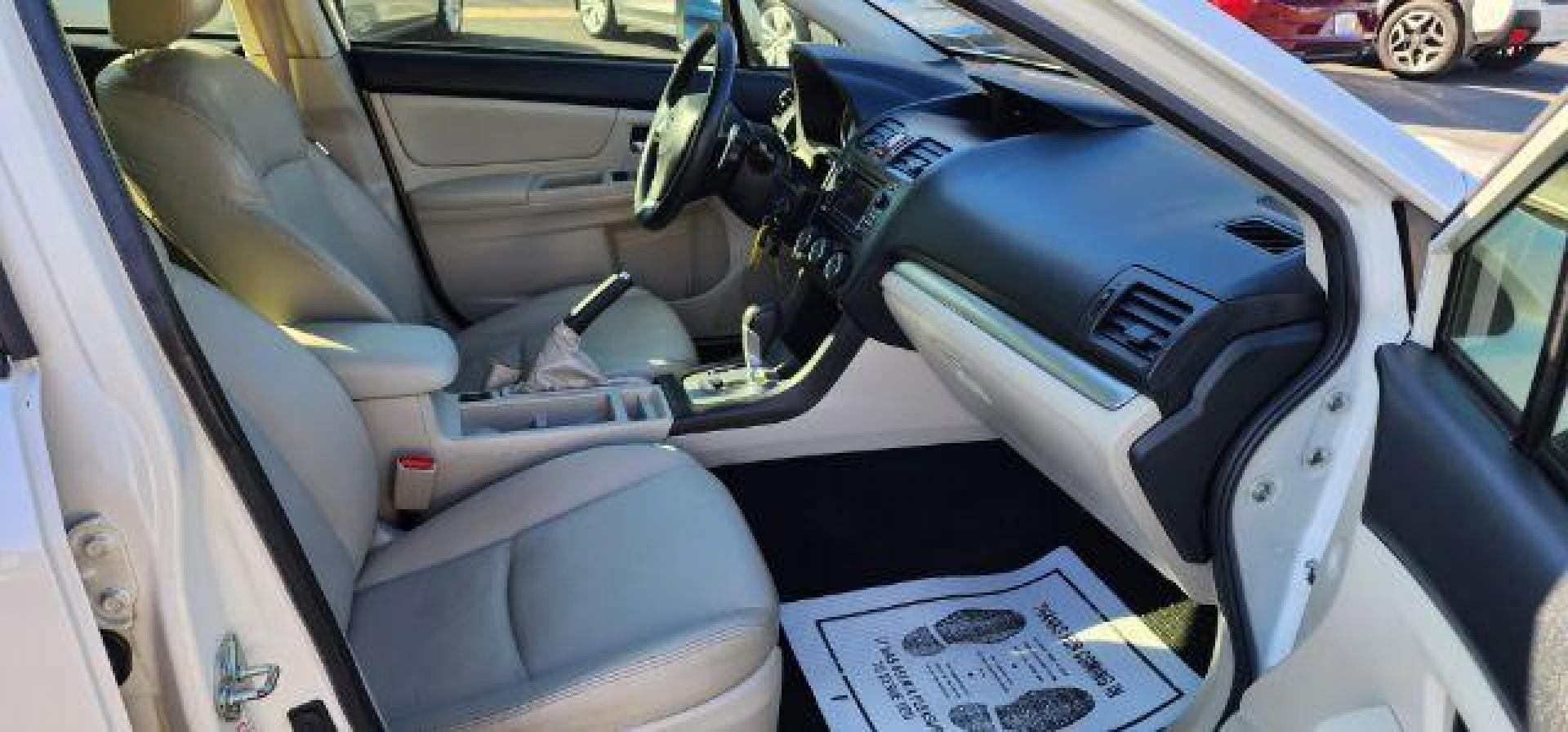 2013 WHITE /Ivory Subaru Impreza 2.0i Sport Limited (JF1GPAR68D2) with an 2.0L L4 engine, CVT transmission, located at 353 S. Mineral St., Keyser, WV, 26726, (304) 788-7887, 39.436451, -78.981674 - Photo#15
