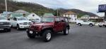 2012 RED /Black Jeep Wrangler Unlimited Sport (1C4BJWDG3CL) with an 3.6L V6 engine, AT transmission, located at 353 S. Mineral St., Keyser, WV, 26726, (304) 788-7887, 39.436451, -78.981674 - Photo#2