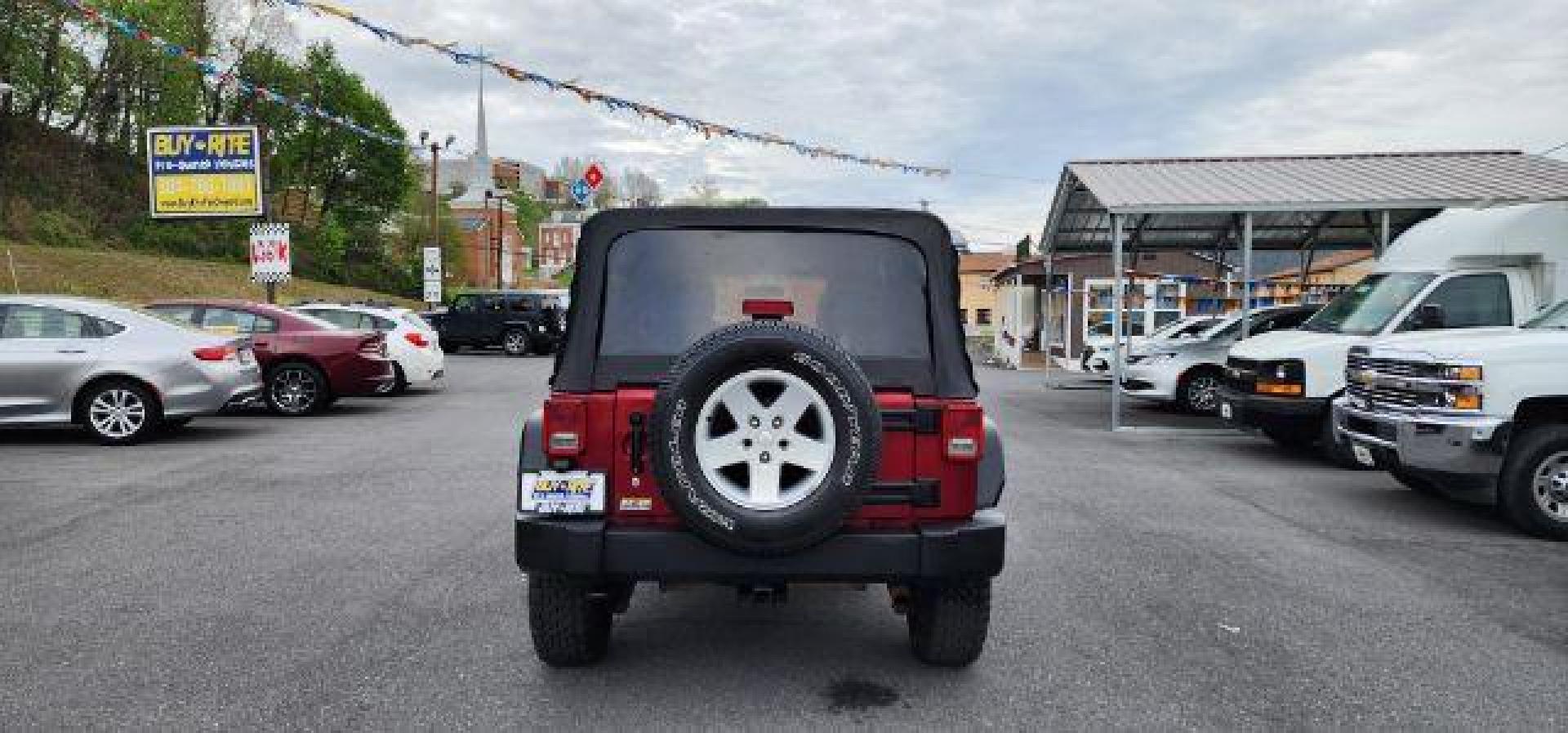 2012 RED /Black Jeep Wrangler Unlimited Sport (1C4BJWDG3CL) with an 3.6L V6 engine, AT transmission, located at 353 S. Mineral St., Keyser, WV, 26726, (304) 788-7887, 39.436451, -78.981674 - Photo#9