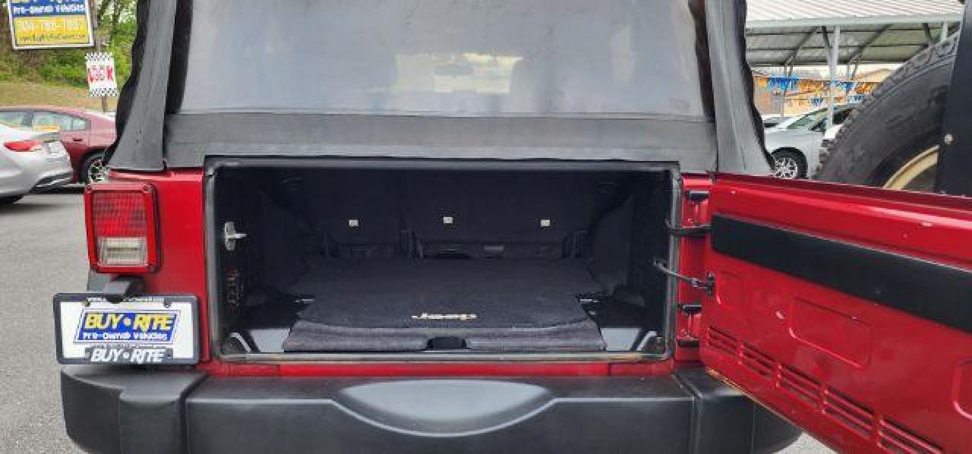 2012 RED /Black Jeep Wrangler Unlimited Sport (1C4BJWDG3CL) with an 3.6L V6 engine, AT transmission, located at 353 S. Mineral St., Keyser, WV, 26726, (304) 788-7887, 39.436451, -78.981674 - Photo#10