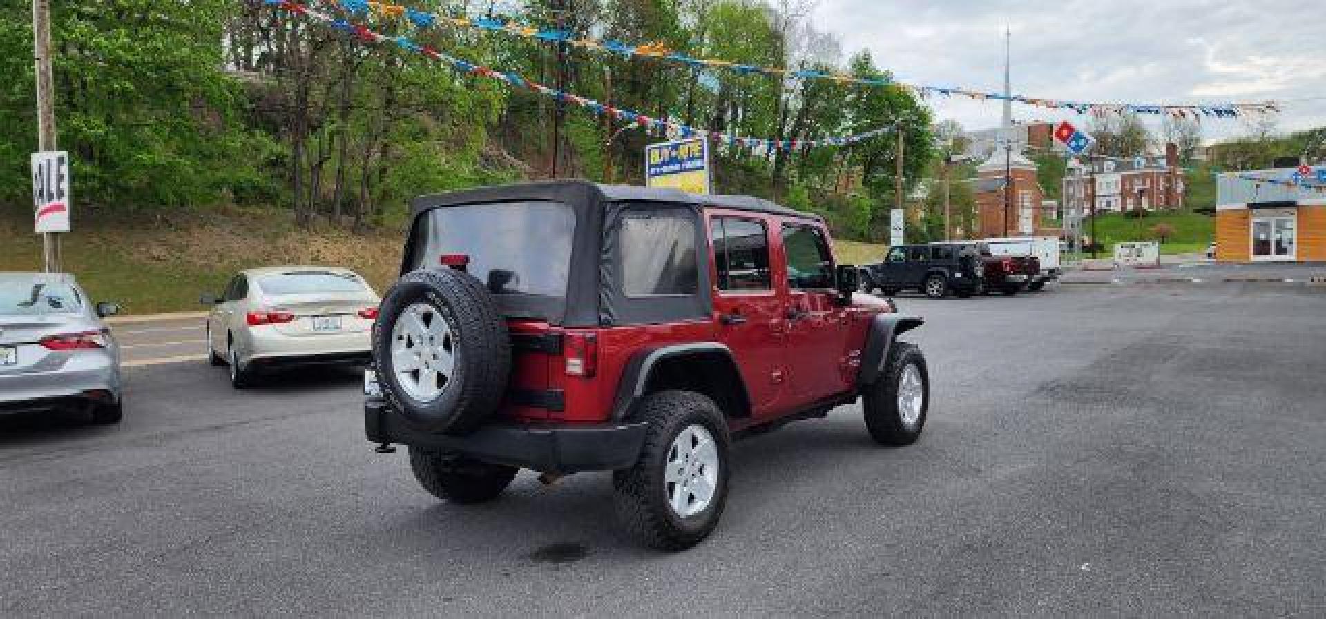 2012 RED /Black Jeep Wrangler Unlimited Sport (1C4BJWDG3CL) with an 3.6L V6 engine, AT transmission, located at 353 S. Mineral St., Keyser, WV, 26726, (304) 788-7887, 39.436451, -78.981674 - Photo#11