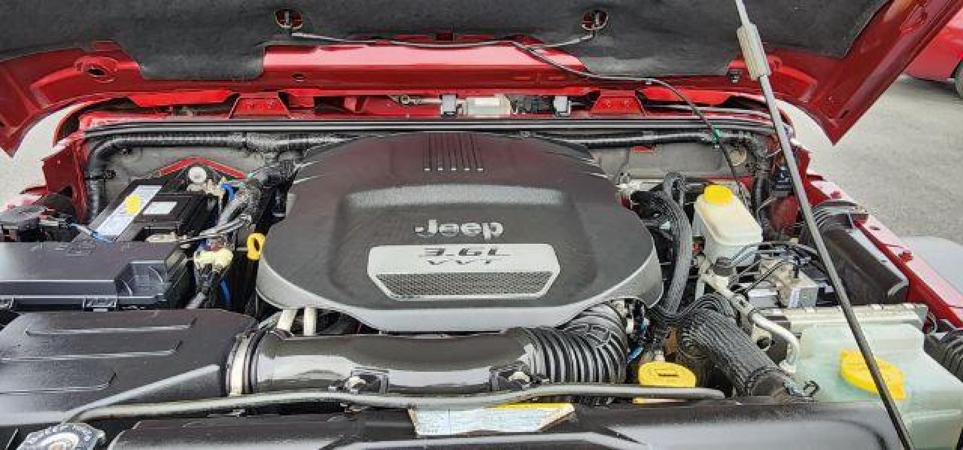 2012 RED /Black Jeep Wrangler Unlimited Sport (1C4BJWDG3CL) with an 3.6L V6 engine, AT transmission, located at 353 S. Mineral St., Keyser, WV, 26726, (304) 788-7887, 39.436451, -78.981674 - Photo#15