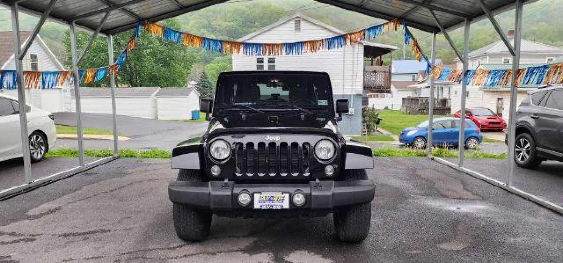 2015 BLACK /Dark Saddle/Black Jeep Wrangler Unlimited Sahara (1C4BJWEG2FL) with an 3.6L V6 engine, AT transmission, located at 353 S. Mineral St., Keyser, WV, 26726, (304) 788-7887, 39.436451, -78.981674 - Photo#1