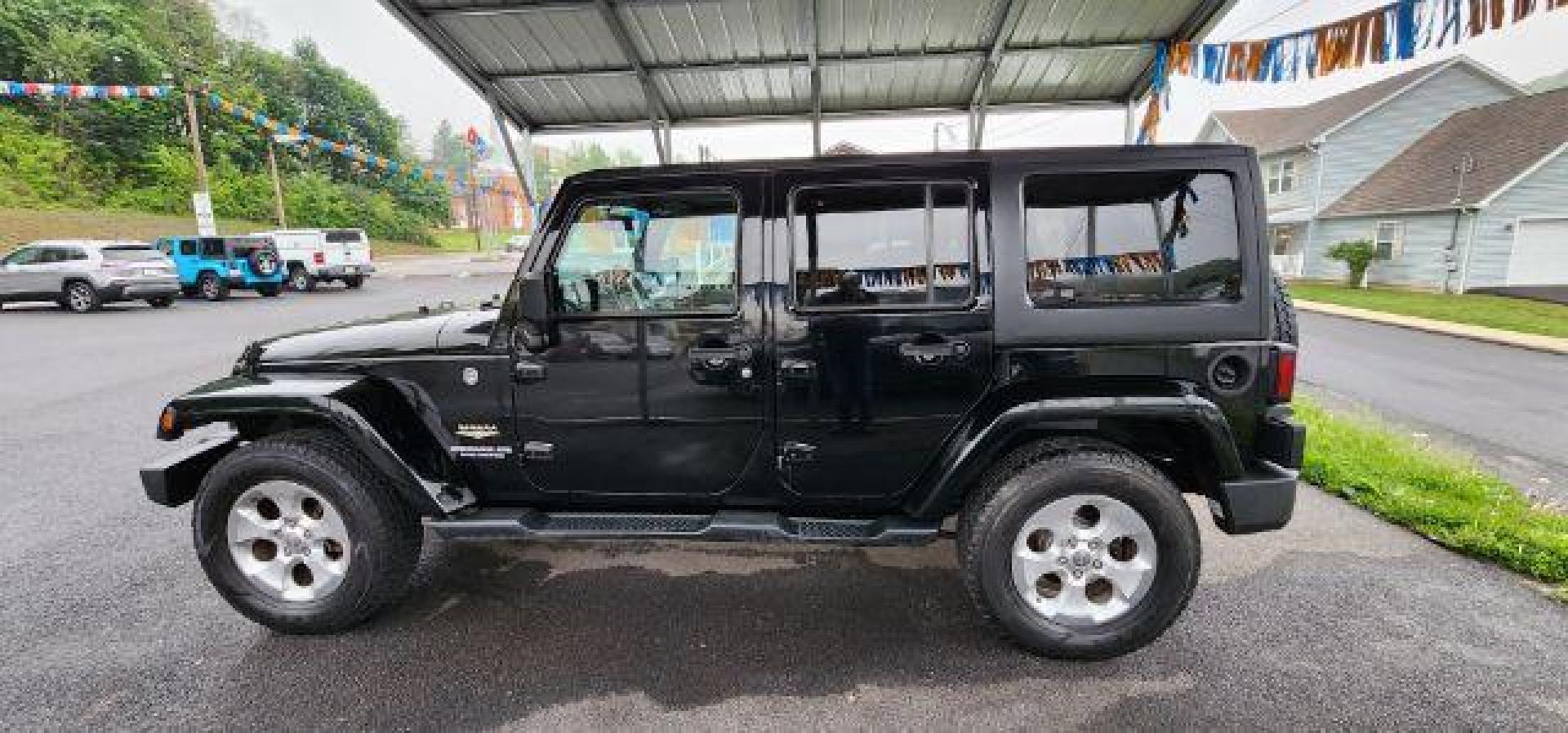 2015 BLACK /Dark Saddle/Black Jeep Wrangler Unlimited Sahara (1C4BJWEG2FL) with an 3.6L V6 engine, AT transmission, located at 353 S. Mineral St., Keyser, WV, 26726, (304) 788-7887, 39.436451, -78.981674 - Photo#3