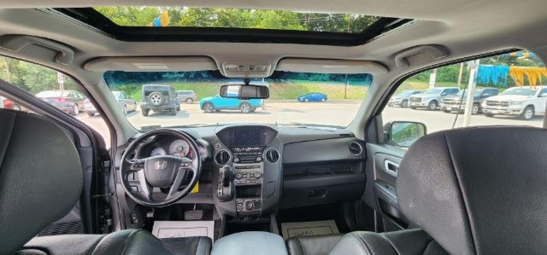2012 GRAY /Black Honda Pilot EX-L (5FNYF3H79CB) with an 3.5L V6 engine, AT transmission, located at 353 S. Mineral St., Keyser, WV, 26726, (304) 788-7887, 39.436451, -78.981674- Photo#6