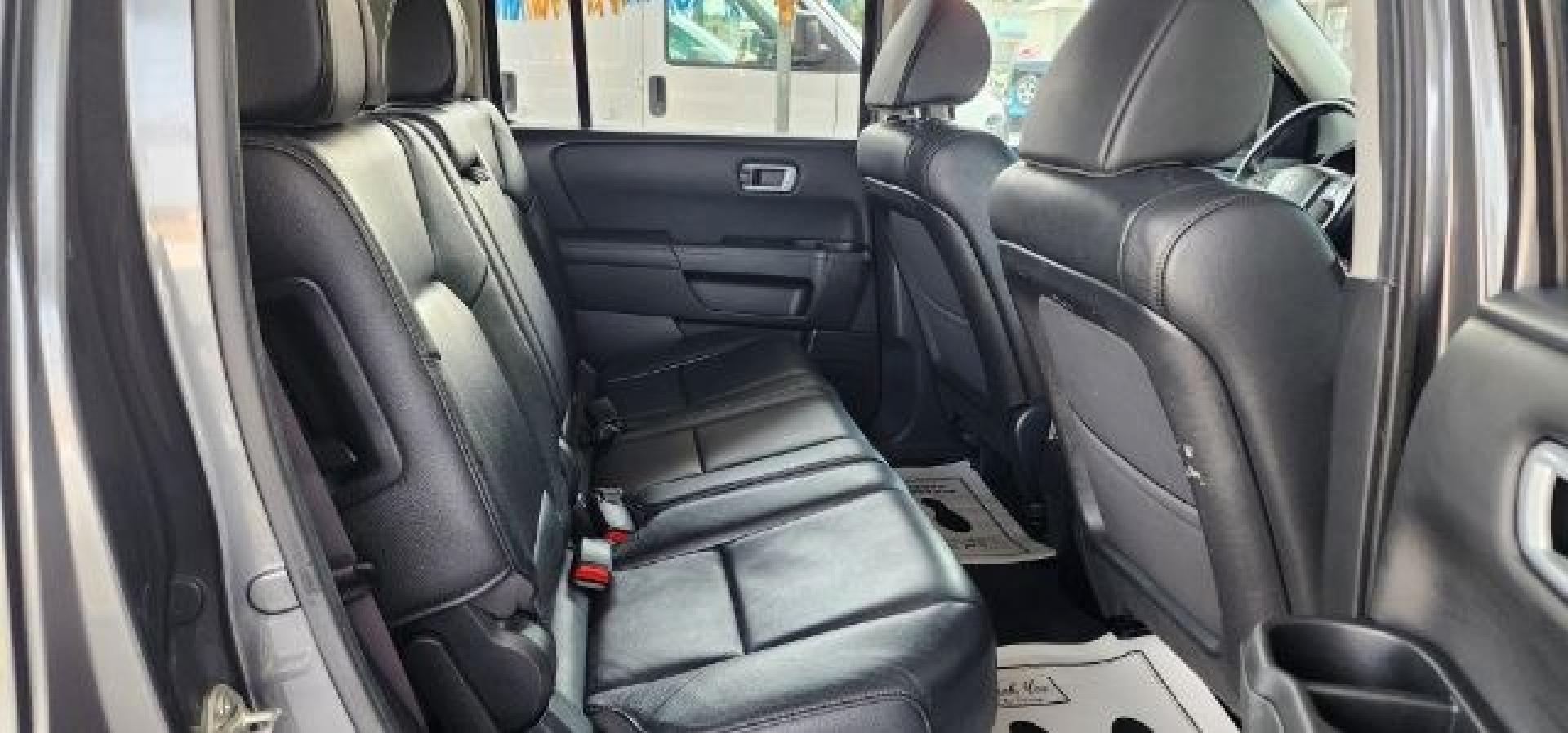 2012 GRAY /Black Honda Pilot EX-L (5FNYF3H79CB) with an 3.5L V6 engine, AT transmission, located at 353 S. Mineral St., Keyser, WV, 26726, (304) 788-7887, 39.436451, -78.981674- Photo#13