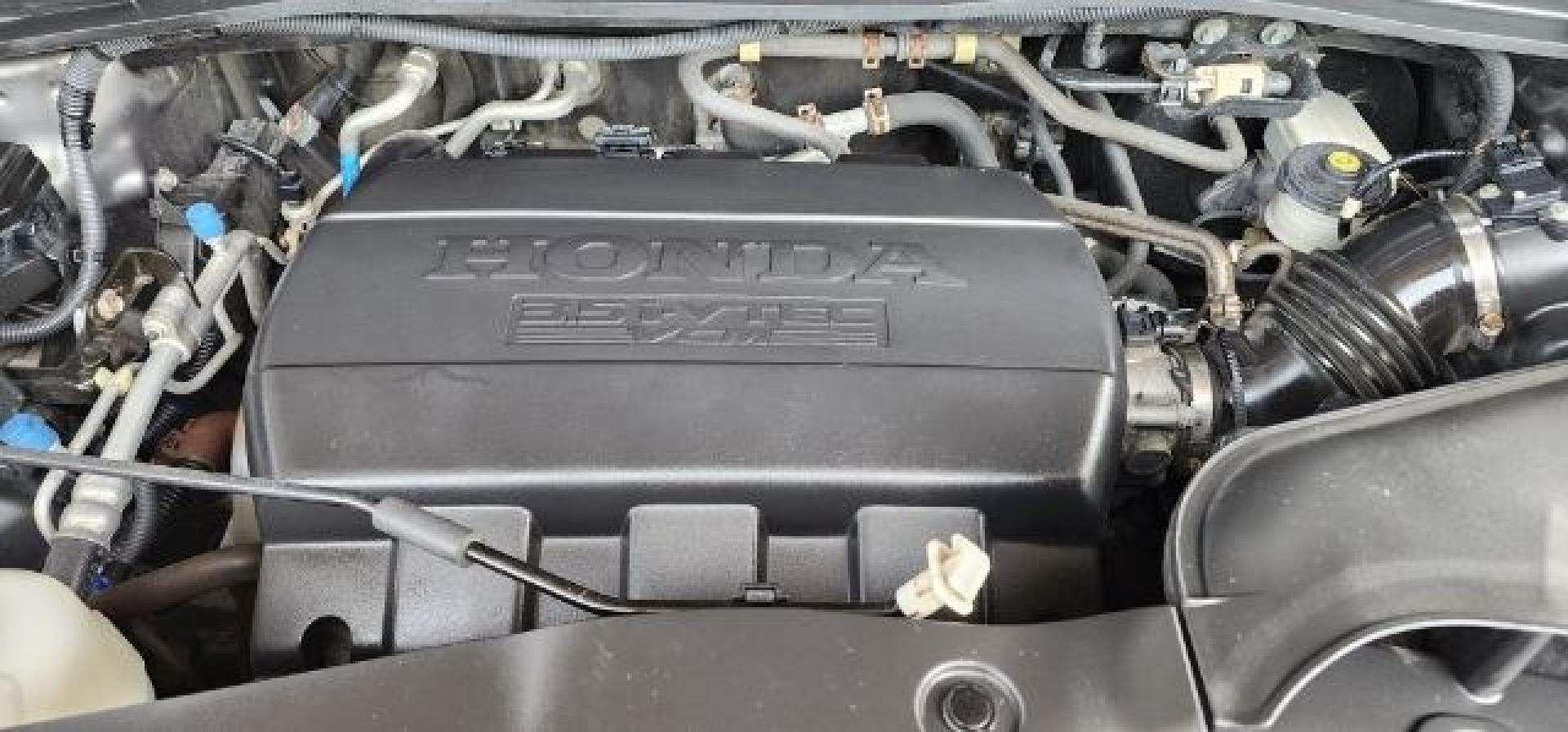2012 GRAY /Black Honda Pilot EX-L (5FNYF3H79CB) with an 3.5L V6 engine, AT transmission, located at 353 S. Mineral St., Keyser, WV, 26726, (304) 788-7887, 39.436451, -78.981674- Photo#16