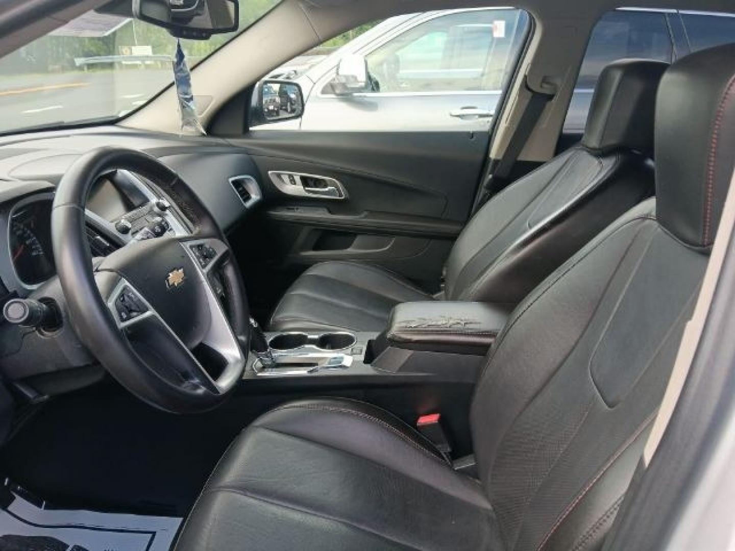 2017 Silver /Jet Black Chevrolet Equinox Premier (2GNFLGEK1H6) with an 2.4L I4 engine, AT transmission, located at 353 S. Mineral St., Keyser, WV, 26726, (304) 788-7887, 39.436451, -78.981674- Photo#1