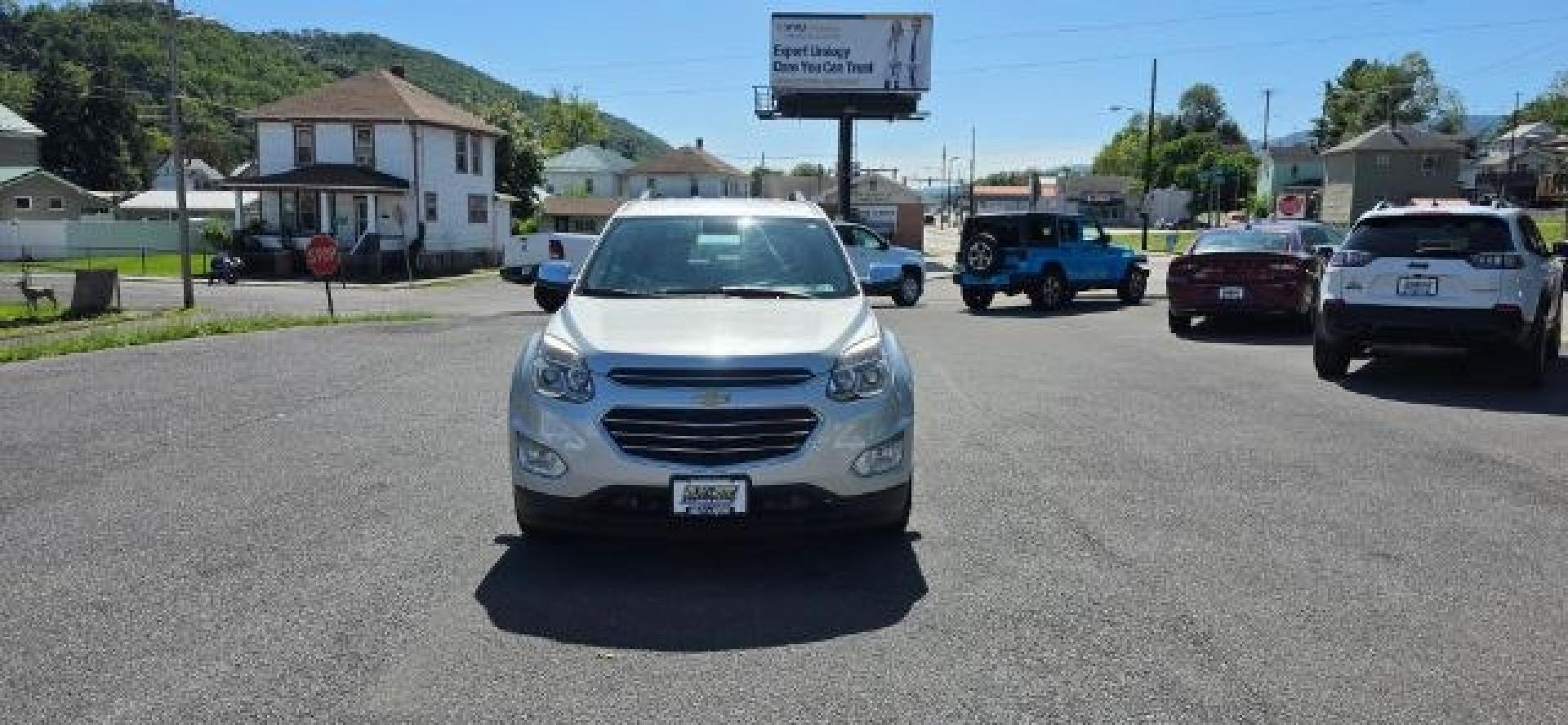 2017 Silver /Jet Black Chevrolet Equinox Premier (2GNFLGEK1H6) with an 2.4L I4 engine, AT transmission, located at 353 S. Mineral St., Keyser, WV, 26726, (304) 788-7887, 39.436451, -78.981674- Photo#1