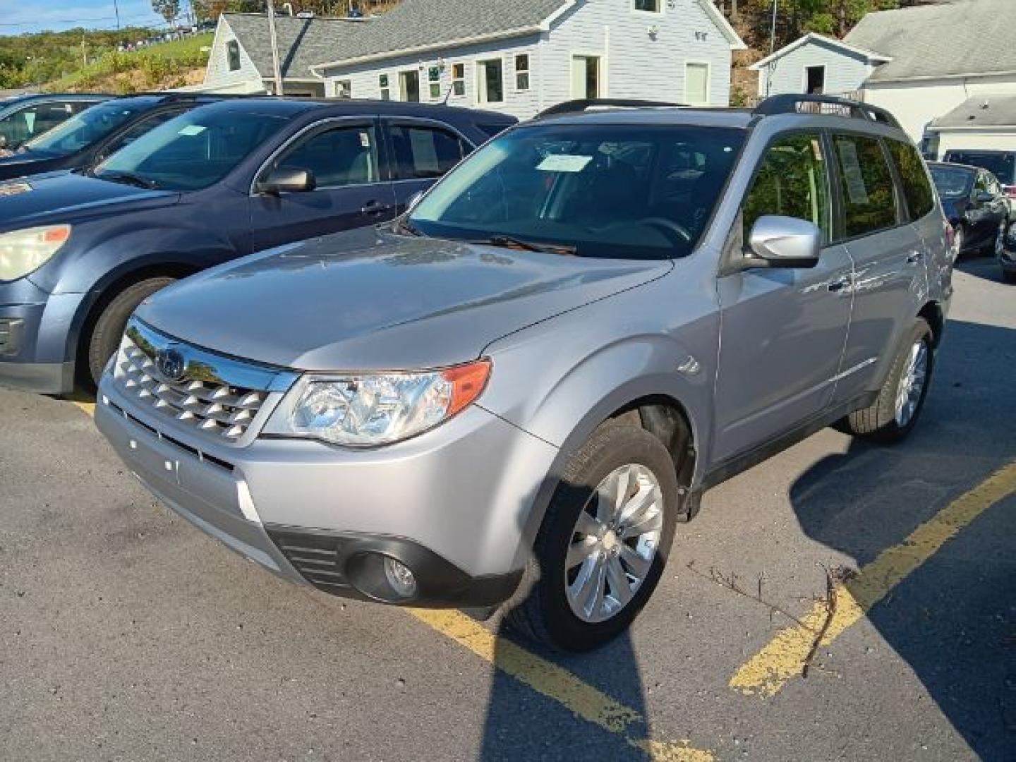 2012 Silver Subaru Forester 2.5X Limited (JF2SHAEC8CH) with an 2.5L H4 engine, AT transmission, located at 353 S. Mineral St., Keyser, WV, 26726, (304) 788-7887, 39.436451, -78.981674- Photo#0