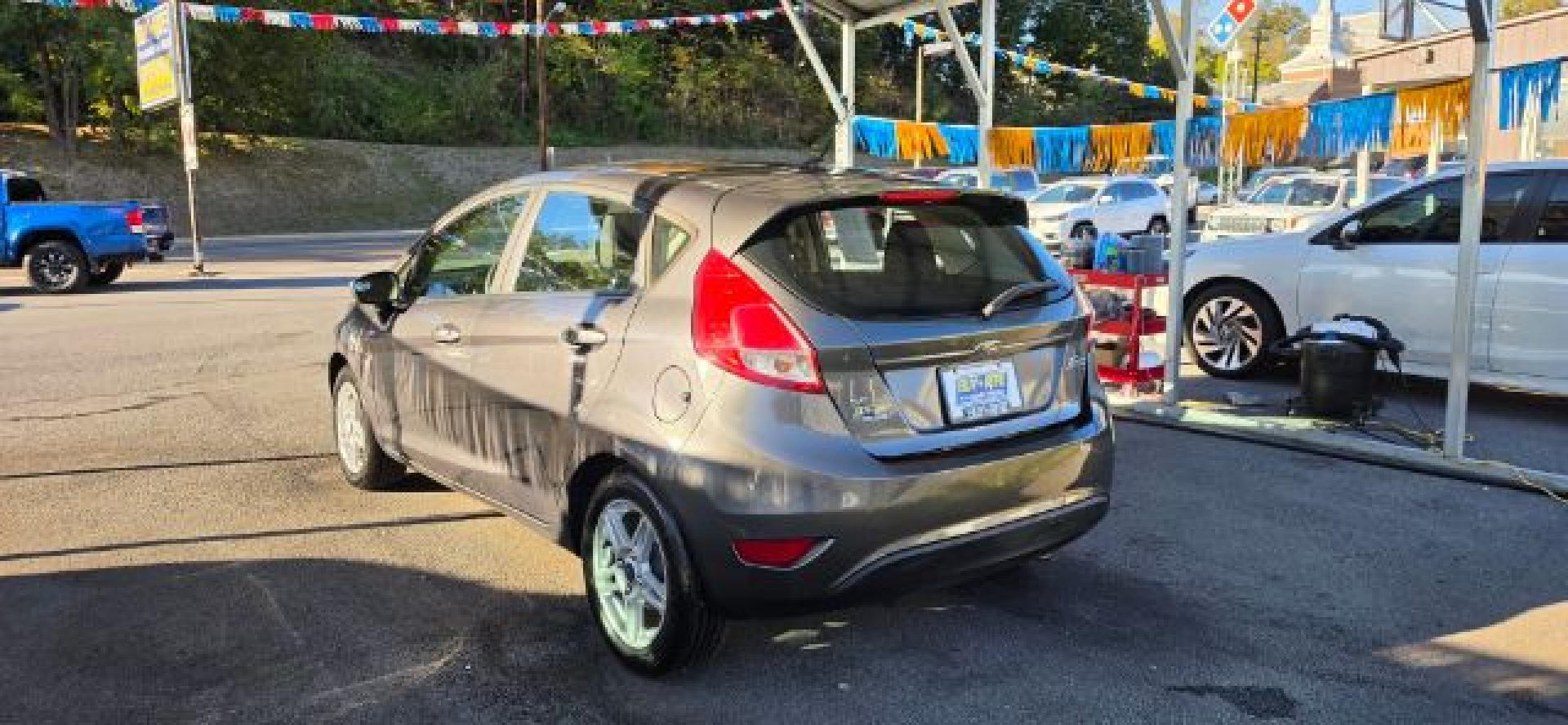 2017 GRAY /Medium Light Stone Ford Fiesta SE (3FADP4EJ0HM) with an 1.6L L4 engine, AT transmission, located at 353 S. Mineral St., Keyser, WV, 26726, (304) 788-7887, 39.436451, -78.981674- Photo#8