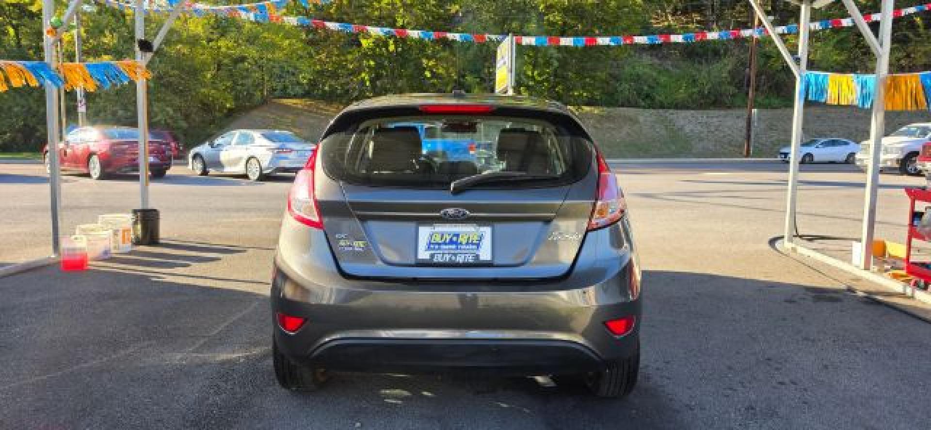 2017 GRAY /Medium Light Stone Ford Fiesta SE (3FADP4EJ0HM) with an 1.6L L4 engine, AT transmission, located at 353 S. Mineral St., Keyser, WV, 26726, (304) 788-7887, 39.436451, -78.981674- Photo#9