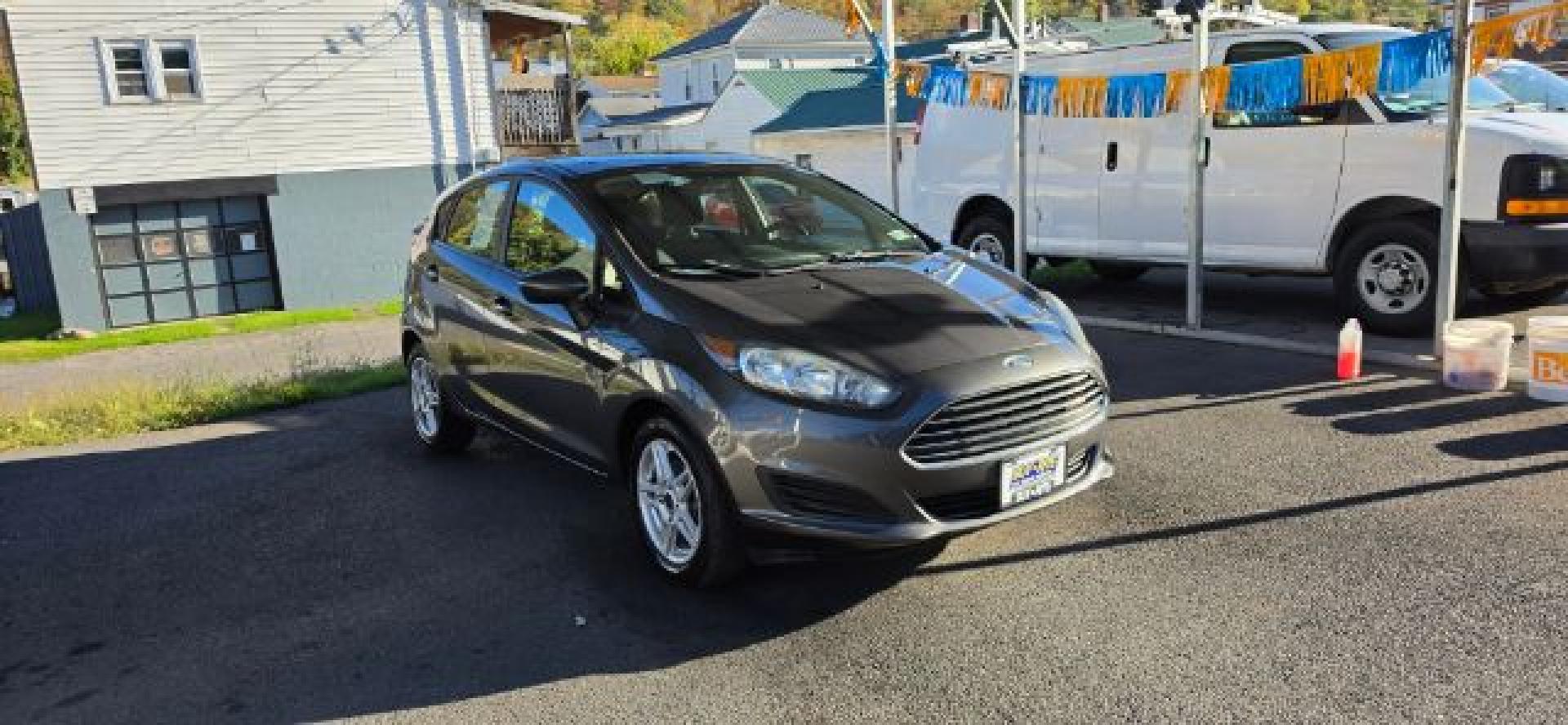 2017 GRAY /Medium Light Stone Ford Fiesta SE (3FADP4EJ0HM) with an 1.6L L4 engine, AT transmission, located at 353 S. Mineral St., Keyser, WV, 26726, (304) 788-7887, 39.436451, -78.981674- Photo#15